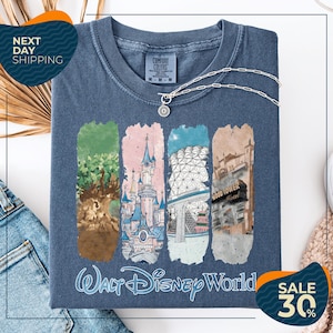 a blue t-shirt with a graphic design depicting various Disney World landmarks, including the Walt Disney World resort, the Wood Tower, and the Epcot Pavilion. The t-shirt is displayed on a white background, and there are two sale signs indicating a 30% discount on the item.