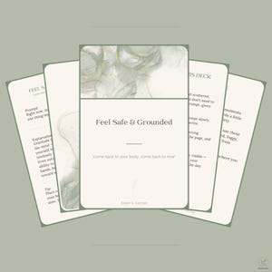 May include: A set of rectangular cards with rounded corners, featuring a sage green and white abstract ink wash design with gold accents. The central card displays the text Feel Safe & Grounded and come back to your body, come back to now.