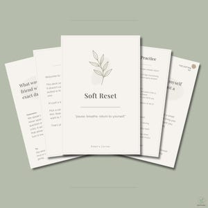 May include: A set of off-white cards titled Soft Reset, featuring a line-art leaf illustration and the text pause, breathe, return to yourself. Each card contains printed instructional text and the brand name Eden's Corner in a minimalist layout.