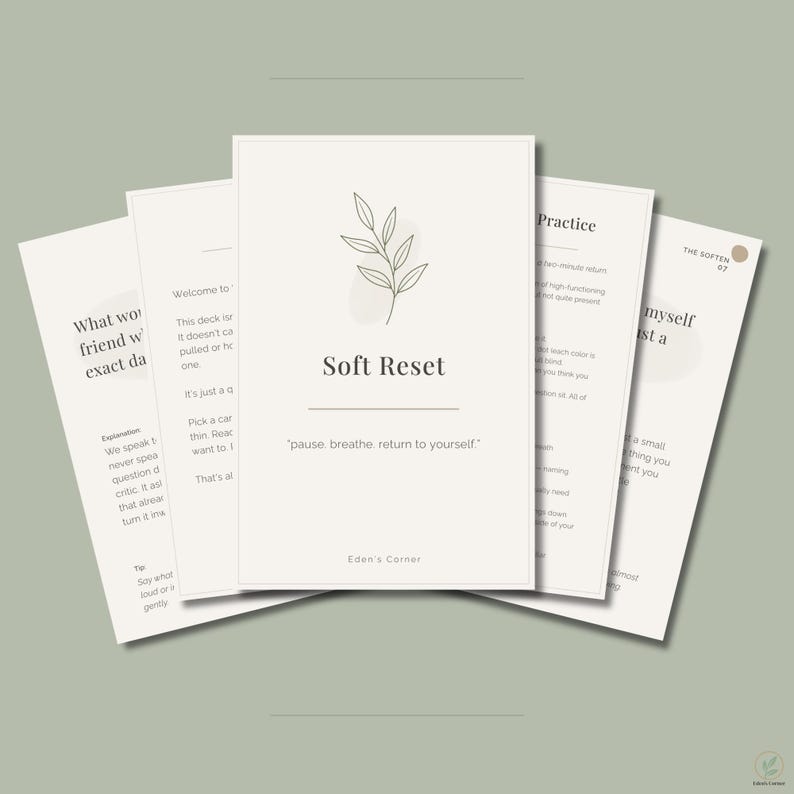 May include: A set of off-white cards titled Soft Reset, featuring a line-art leaf illustration and the text pause, breathe, return to yourself. Each card contains printed instructional text and the brand name Eden's Corner in a minimalist layout.