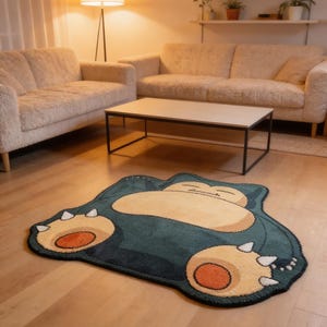 Op de afbeelding: Een set van drie keramische mokken met een gespikkelde, matte afwerking. Elke mok heeft een andere kleur: lichtblauw, crème en grijs. De mokken hebben een eenvoudig, modern ontwerp en een comfortabele handgreep.