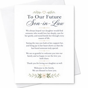 May include: A white greeting card featuring the text To Our Future Son-in-Law in dark blue and black script. The card includes a heartfelt message about welcoming a son-in-law into the family, decorated with gold line accents and a floral illustration.