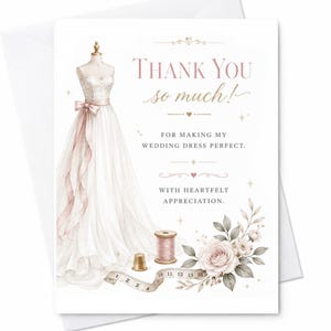 May include: A white greeting card featuring a dress form wearing a white wedding gown with a pink sash, a spool of pink thread, a gold thimble, a measuring tape, and a rose illustration. Text reads: THANK YOU so much! FOR MAKING MY WEDDING DRESS PERFECT. WITH HEARTFELT APPRECIATION.