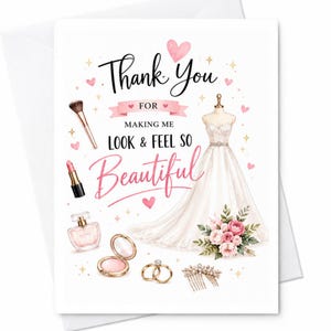 May include: A greeting card featuring a white wedding dress on a mannequin, a bouquet of pink roses, makeup items including a brush, lipstick, perfume, and compact, two gold rings, and a hair comb, with the text Thank You FOR MAKING ME LOOK & FEEL SO Beautiful.