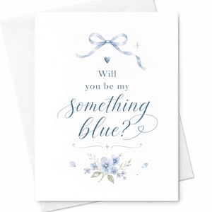May include: A white greeting card featuring a watercolor illustration of a light blue ribbon bow, a small heart, and a floral arrangement at the bottom. The text reads, Will you be my something blue? in elegant blue script and serif lettering.