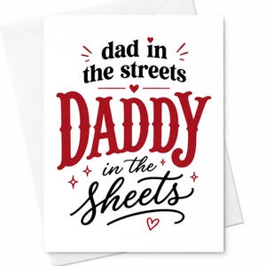 May include: A white greeting card with a matching envelope. The card features the text "dad in the streets" above the word "DADDY" in red, and "in the sheets" below. The text is in a mix of fonts and styles.