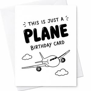 May include: A white birthday card with a black and white illustration of an airplane and clouds. The text on the card reads "THIS IS JUST A PLANE BIRTHDAY CARD". The card is inside a white envelope.