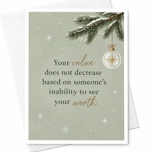 May include: A greeting card with a sage green background featuring a snow-dusted pine branch and a hanging glass ornament. The text reads: Your value does not decrease based on someone's inability to see your worth. White star accents are scattered.