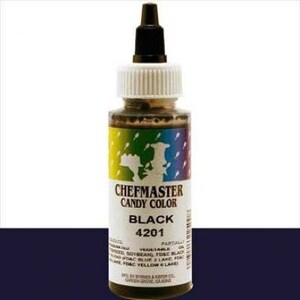 May include: A bottle of Chefmaster Candy Color in black. The label features the brand name, product type, and color, along with the number 4201. The bottle has a black dropper top and a white cap. The label has a rainbow design.
