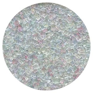 May include: A close-up of iridescent pastel sugar sprinkles. The sprinkles are small and irregular in shape, with a mix of light blue, pink, and white.