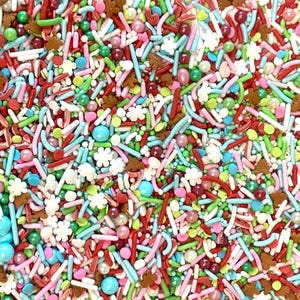 May include: A colorful mix of sprinkles for baking and decorating. The sprinkles include red, green, white, blue, and brown sprinkles in various shapes and sizes.