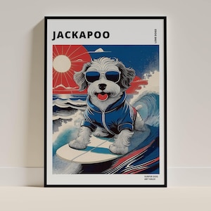 May include: A framed art print featuring a Jackapoo dog surfing. The dog wears sunglasses and a blue jacket, riding a surfboard on a wave. The background shows a red and blue sunset over the ocean. Text at the top reads "JACKAPOO".