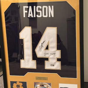 Jordan Faison Signed Notre Dame Lacrosse Jersey Shadow Box | “2024 Champs” Inscription | Framed Display | Beckett Authenticated