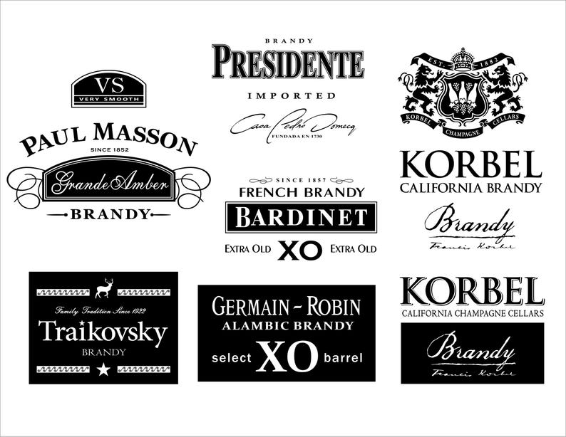 May include: A collection of black and white brandy labels, including "Paul Masson," "Korbel," and "Bardinet." The labels feature various fonts and designs, with some including text like "Extra Old" and "California Brandy."