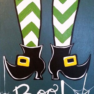 May include: A painting on a dark teal background featuring a pair of legs in green and white chevron striped stockings, wearing black pointed shoes with yellow buckles. Below the feet, the word Boo! is written in white with a spider and web.