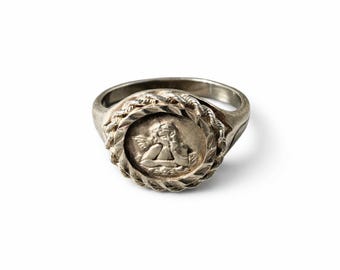 Antyczny srebrny pierścień sygnetowy z aniołkiem i obrączką z motywem Kupidyna, rozmiar 7, 4,14 g