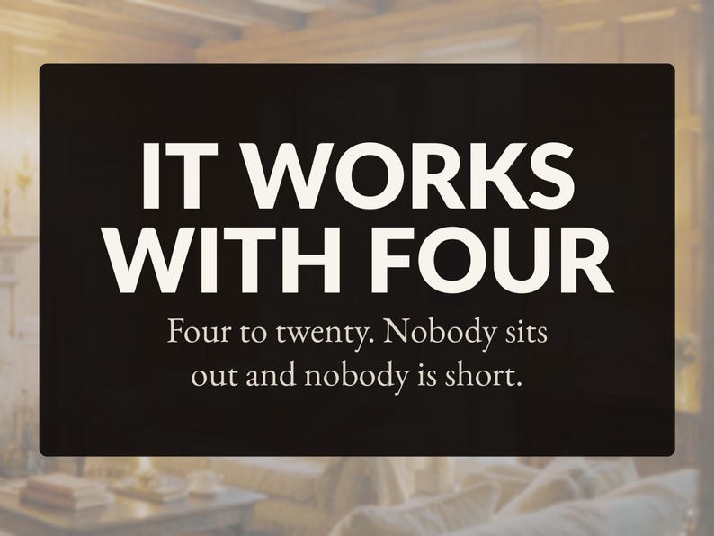 May include: A black rectangular sign featuring white text that reads: IT WORKS WITH FOUR. Below this, smaller white text states: Four to twenty. Nobody sits out and nobody is short. The background is a dark, solid color with a matte finish.