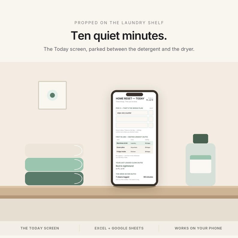 May include: A smartphone displaying the Home Reset Today screen, positioned on a shelf between a stack of three coloured towels and a bottle. Text reads: Propped on the laundry shelf, Ten quiet minutes, The Today screen, parked between the detergent and the dryer, Excel + Google Sheets, Works on your phone.