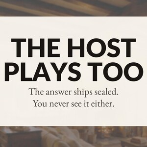 May include: A rectangular off-white sign with black text that reads THE HOST PLAYS TOO, followed by the smaller text The answer ships sealed. You never see it either. The sign has a clean, minimalist design with bold, sans-serif lettering.