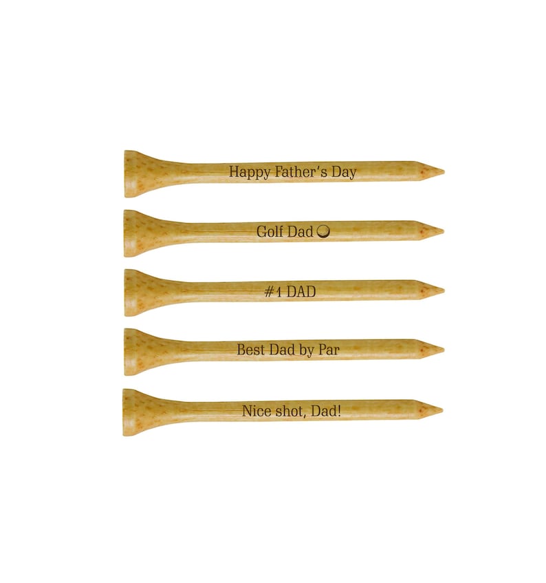May include: Set of five wooden golf tees with engraved messages: "Happy Father's Day", "Golf Dad", "#1 DAD", "Best Dad by Par", and "Nice shot, Dad!"