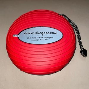 NUOVO contenitore rigido Discgear per 20 dischi CD/DVD - Custodia rigida Discus Sport - Rosso