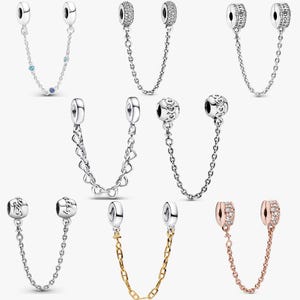 May include: A white ceramic mug with a black handle and the text "But First, Coffee" in a handwritten style. The mug is on a white surface. The mug is approximately 10 cm tall.