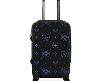 Maleta de lujo con monograma de buitre