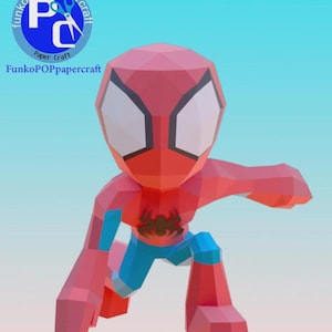 以下が含まれることがあります： 赤、青、黒のペーパークラフトのスパイダーマンのフィギュア。しゃがんだポーズで、胸に黒いクモのエンブレムが付いた幾何学的なデザインです。FunkoPOPpapercraft製。