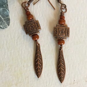 Dark orange/adobe tribal dangle earrings. image 1