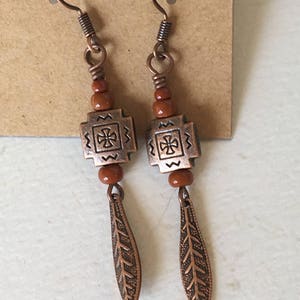 Dark orange/adobe tribal dangle earrings. image 3