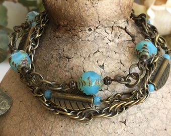 Back to the Beach aqua opalite picasso czech bicone and brass adjustable bracelet.