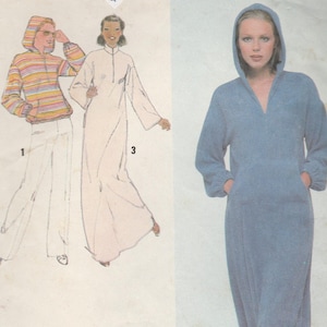 May include: Vintage Simplicity pattern envelope, size 10 Misses. The envelope features illustrations of hooded loungewear and a long-sleeved dress. The main image shows a woman in a blue hooded dress with pockets. The text "Simplicity 8793" is visible.