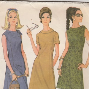 May include: A vintage sewing pattern for a dress in two styles. The pattern is for sizes 14 and 34 bust. The pattern is from McCall's and is dressmaker tested. The pattern is 65 cents and 75 cents in Canada.