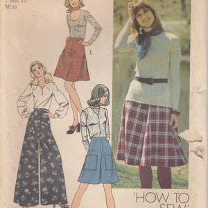May include: A vintage sewing pattern for a skirt and blouse. The pattern is for size 6, with a 23 inch waist. The pattern includes a tissue lesson chart on how to apply a waistband with back closing.