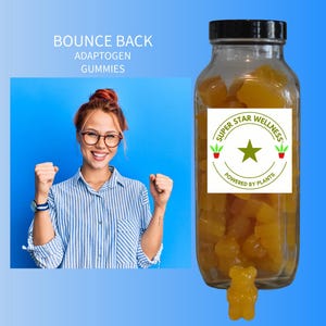 May include: A clear glass jar filled with yellow gummy candies, with a black lid and a white label that reads "Super Star Wellness Powered by Plants." A single gummy bear is attached to the bottom. The image also includes a woman with glasses and the text "Bounce Back Adaptogen Gummies."