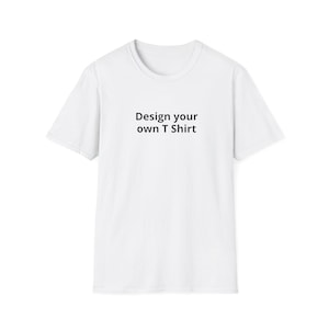 May include: A white t-shirt with the text "Design your own T Shirt" printed in black. The shirt has a crew neck and short sleeves. The image is a studio shot of the shirt.