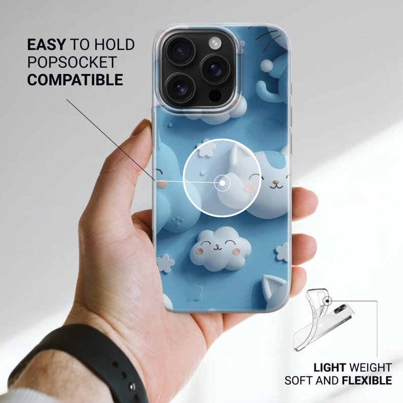 May include: A clear smartphone case featuring a light blue background with a repeating pattern of white 3D-style clouds and cat faces. Text on the image reads EASY TO HOLD POPSOCKET COMPATIBLE and LIGHT WEIGHT SOFT AND FLEXIBLE.