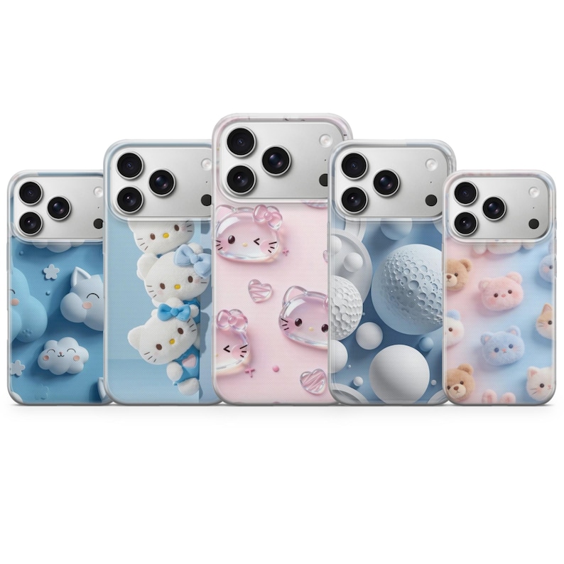 May include: Five smartphone cases featuring distinct designs: a blue case with clouds, a blue case with stacked white cat characters, a pink case with translucent cat faces and hearts, a blue case with white spheres, and a blue case with small bear faces.