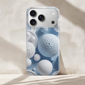 May include: A smartphone case featuring a light blue background decorated with various white spheres, including some with textured, cratered surfaces. The case has a clear border and a cutout section at the top for the phone camera lenses.