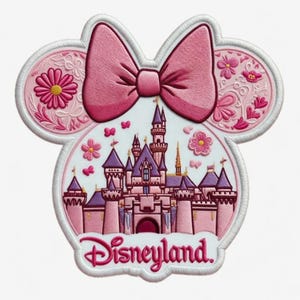 May include: Embroidered patch with a pink bow and mouse ears design. The patch features a pink castle with purple turrets, the word "Disneyland" in script, and floral accents. The patch is outlined in white.
