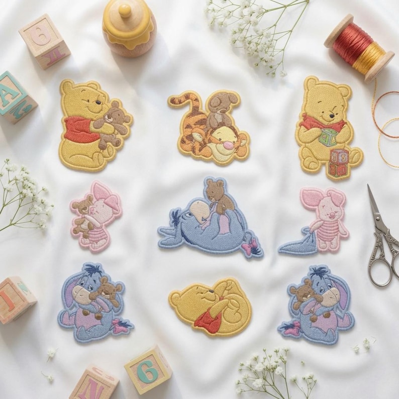 May include: A collection of embroidered fabric patches featuring Winnie the Pooh characters including Pooh, Tigger, Piglet, and Eeyore. The patches depict various scenes of the characters holding small teddy bears or playing with blocks.