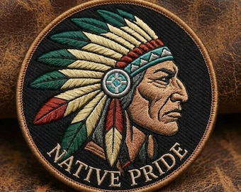 May include: Round embroidered patch featuring a Native American chief in profile, wearing a feathered headdress with red, green, and yellow accents. The patch has the words "NATIVE PRIDE" in white lettering on a black background.