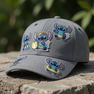 May include: Gray baseball cap decorated with colorful Stitch patches in various beach-themed poses. The patches feature Stitch wearing sunglasses, a hat, and a floatie. The cap is made of a durable fabric and has a curved brim.
