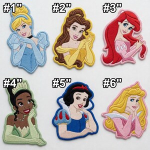May include: Embroidered patches featuring six different princess designs. Each patch showcases a princess with vibrant colors and detailed stitching. The princesses include Cinderella, Belle, Ariel, Tiana, Snow White, and Aurora.