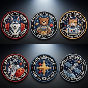 May include: Six circular embroidered patches with space exploration themes. Designs include a husky, teddy bear, cat, astronaut, compass star, and satellite. Each patch has unique text and colour schemes, with phrases like 'Gazing at the Cosmos' and 'Charting the Unknown'.