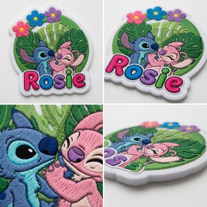 May include: An embroidered patch featuring a blue alien character and a pink alien character embracing in front of green tropical leaves and colorful flowers. The name Rosie is stitched in large, multi-colored letters at the bottom of the patch.