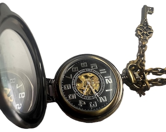 Beautiful watch movement Steampunk Brass Pocket watch with key charm.