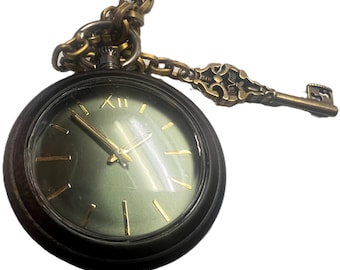 Reflective emerald color Steampunk Pocket watch with key.