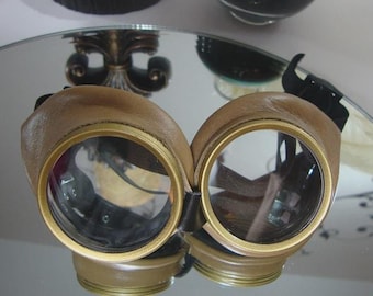 Tan Leather steampunk goggles. Brass colored metal, quality desert eyewear.