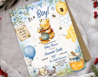 May include: A baby shower invitation card featuring Winnie the Pooh with a honey pot, bees, a beehive, and blue balloons. The text reads: It's a Boy!, A Sweet Little Boy is on his way!, Please join us for a Baby Shower honoring Hannah Smith, August 30th, 1 PM-5 PM, The Smith Residence, 654 Farm Circle, Austin, USA, RSVP at 123-0957-0000.
